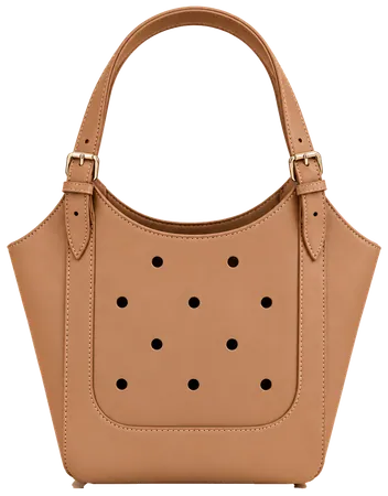 A tan shoulder bag with two buckled straps and nine round holes in a raised patch on its front